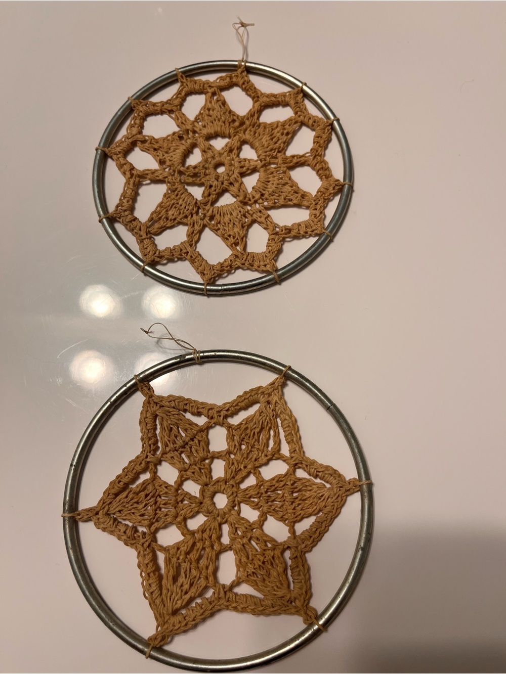 Set of 2 - 4” Round Metal Hand Stitched Ornaments